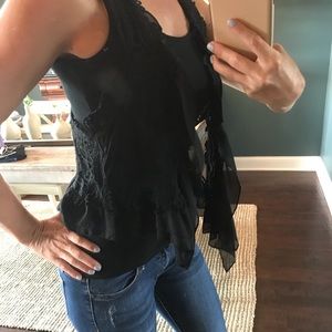 Black lace vest.